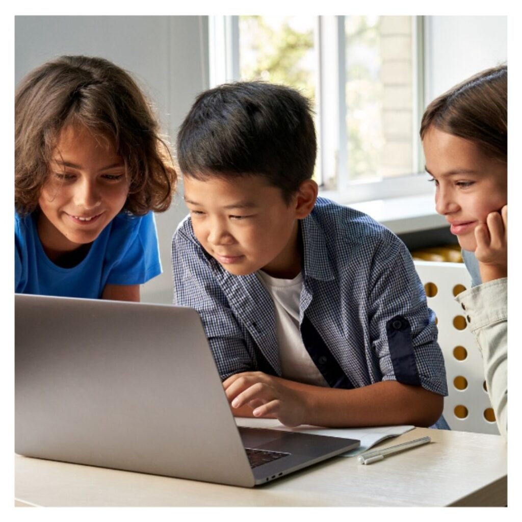 kids looking at laptop