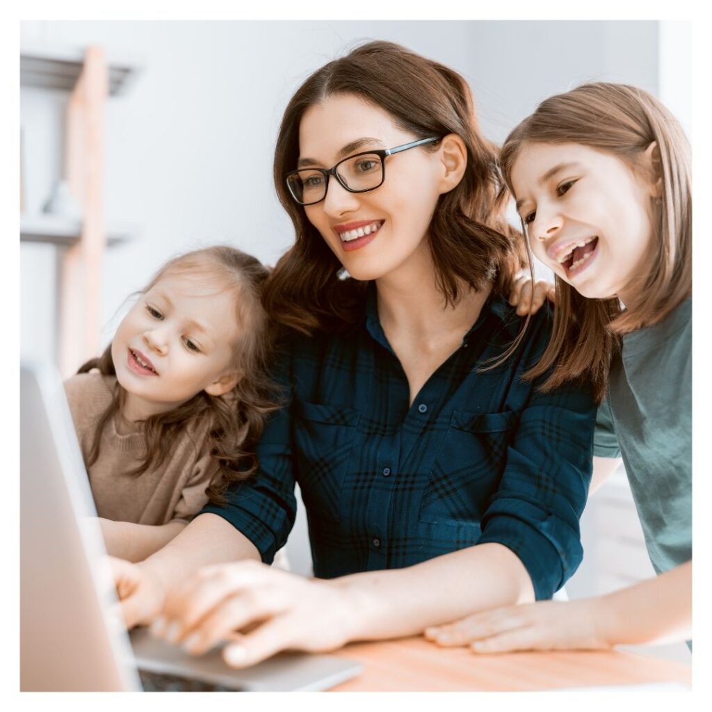 mother with children on a computer