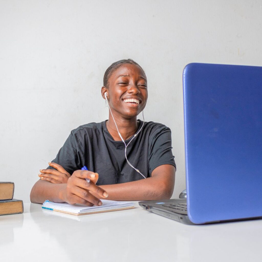 high school student watching a writing lesson