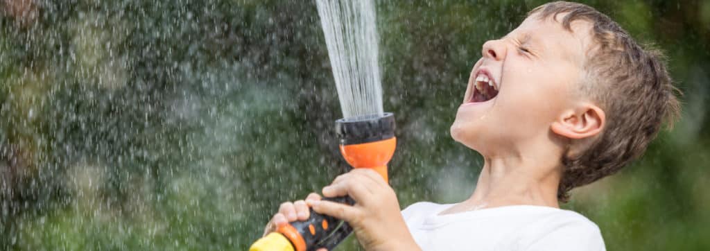 Boy Spraying Water 6 20 19