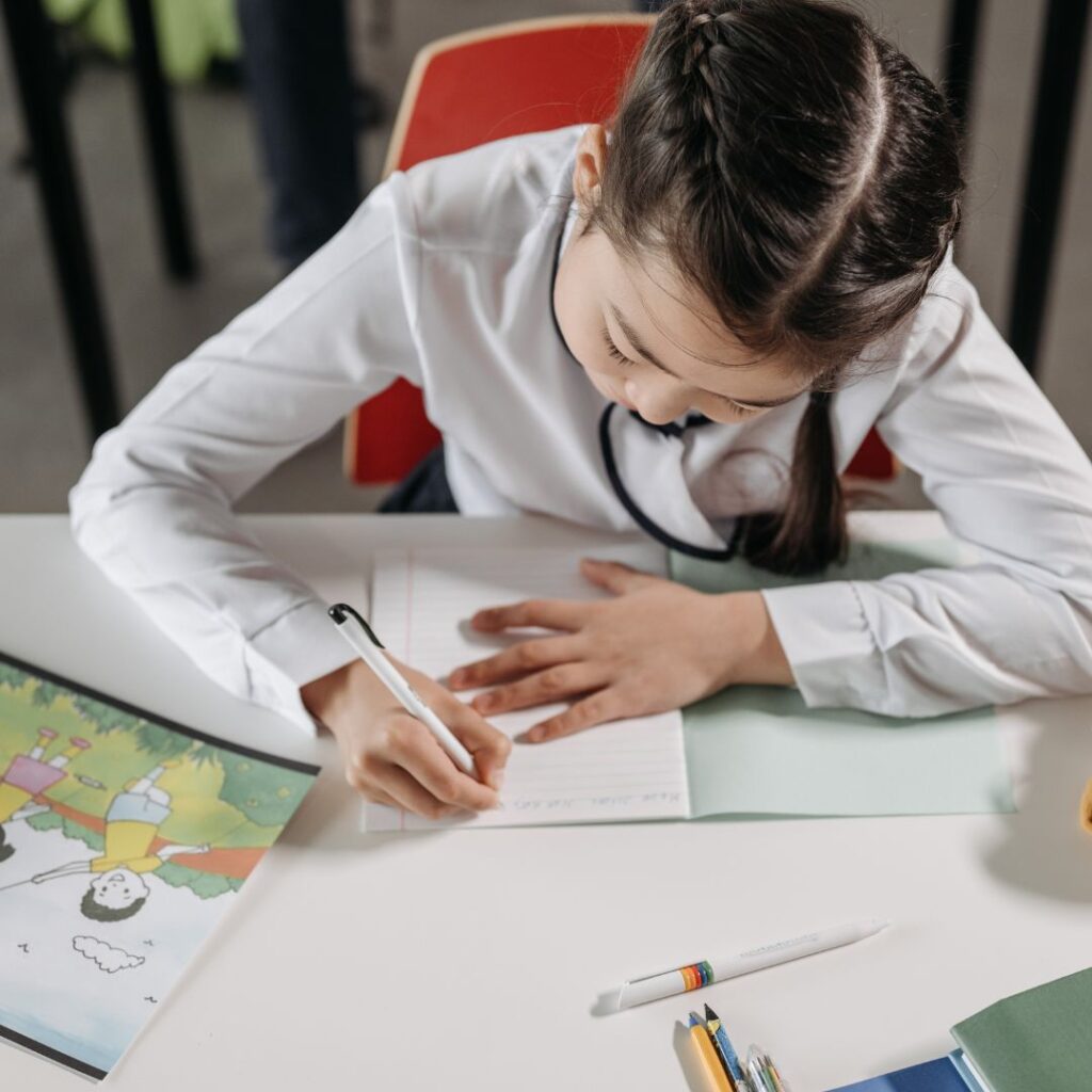 girl focusing on creative writing