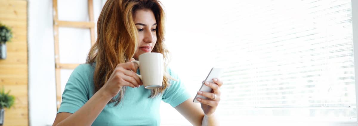 lady on phone with mug 1