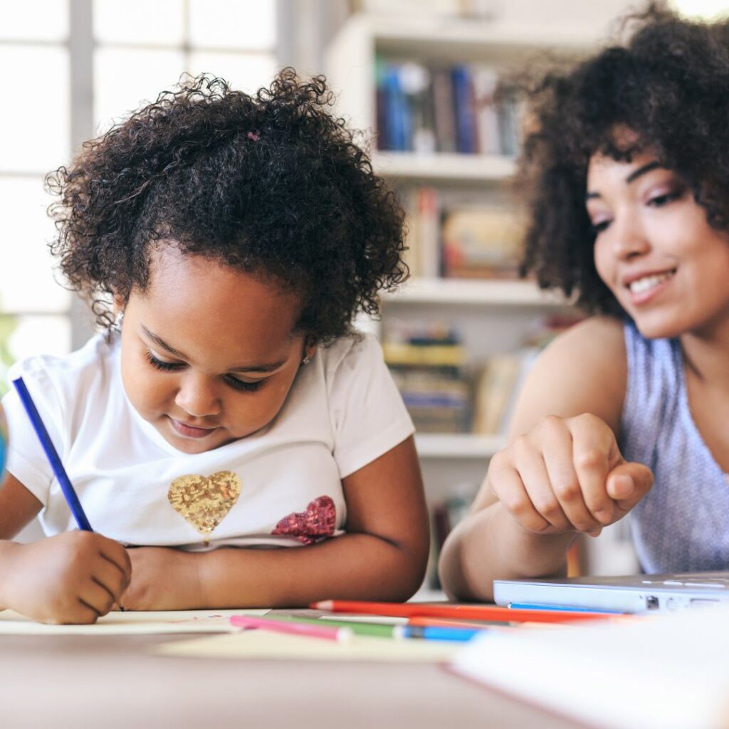 mother watching child write