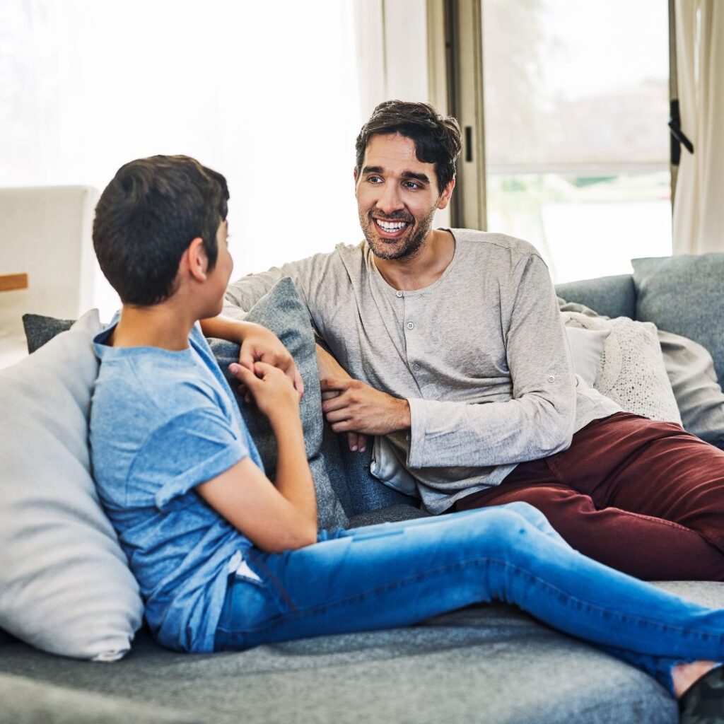 father talking to son