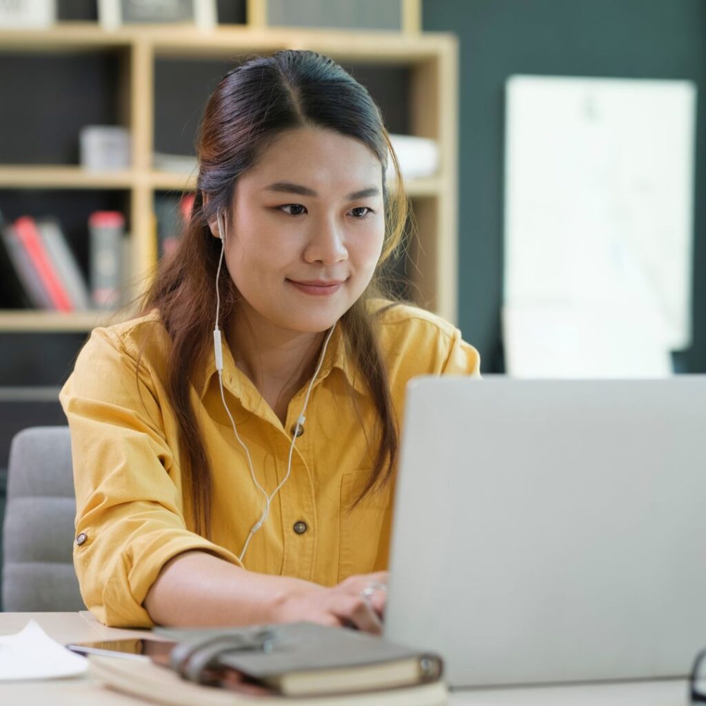 student working on computer