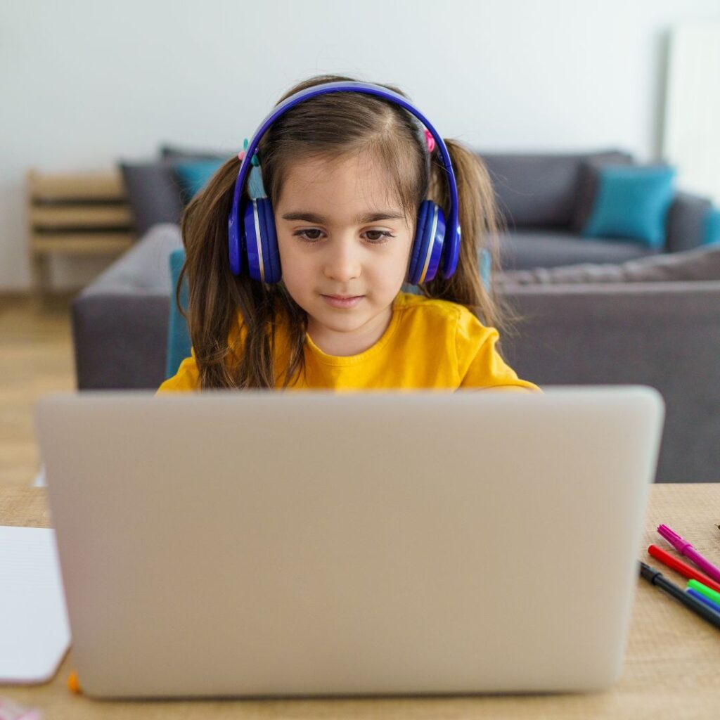 child working from computer