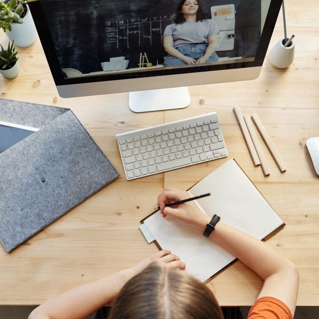 A student watching instructional videos