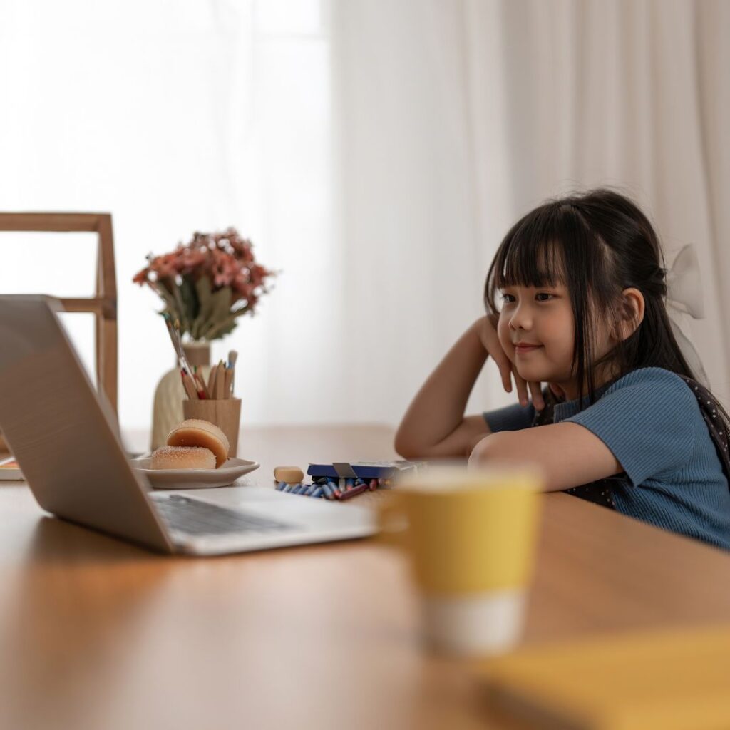 child watching a writing lesson